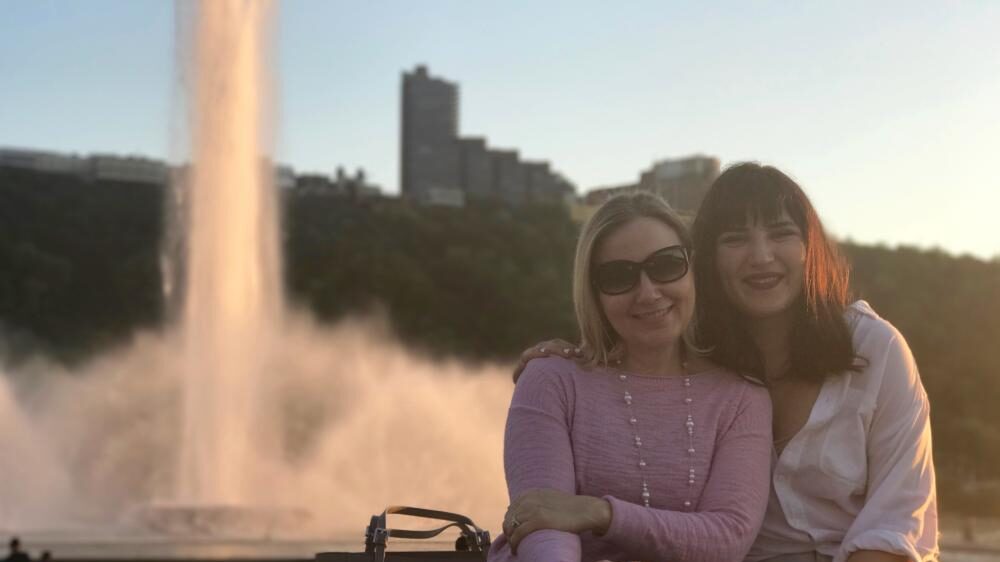 Erifili Draklellis and her mom in front of the water fountain at Point State Park.