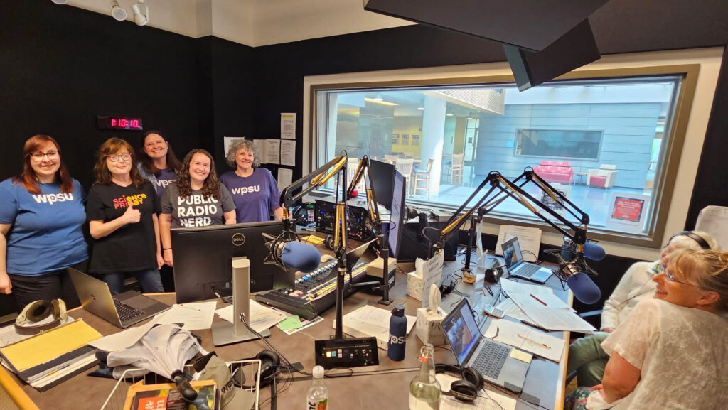 WPSU radio hosts in the WPSU booth